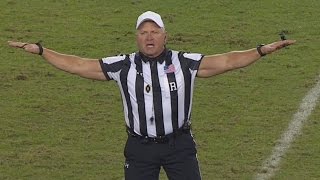 Fans Can't Help But Fawn Over 55-Year-Old Football Referee's Biceps