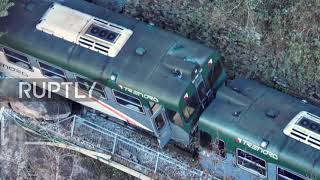 Italy: Railway carriage blocks mountain tunnel after train derailment in Lombardy *DRONE FOOTAGE*