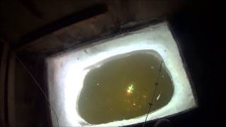 Fishing Lake Winnibigoshish Through a Spear Hole (Dixon  Lake Resort)