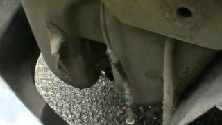 мотор омывателя в Ford Escort МК4, расположение