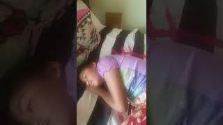 Waking up the birthday girl by tickling her feet