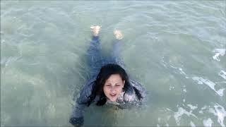 Wetlook office clothes at beach