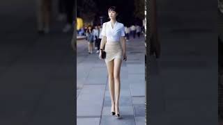 Beautiful long legged woman laughing
