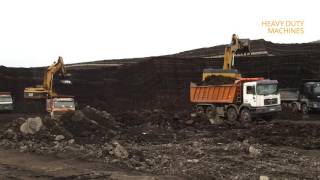 Caterpillar 365C LME Vs Caterpillar 375 loading trucks with 3 pass
