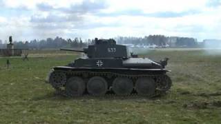 SdKfz 251 and T - 38 in action