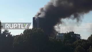 Italy: Smoke billows after fire in 15-storey building in Milan
