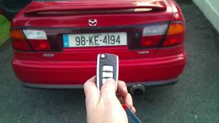 Mazda 323S - bagażnik otwierany z pilota
