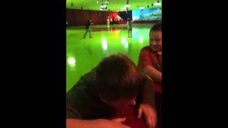 Dylan biting it at the skate rink