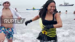 USA: NYC 'polar bears' brave cold Atlantic waters for annual plunge