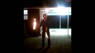 Will Greene juggles fire