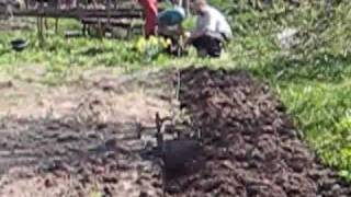 Вспашка земли чудо-плугом и лебёдкой.Plowing