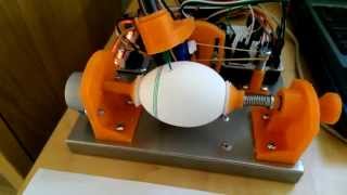 "Interactive numerical controlled egg-decorating machine"