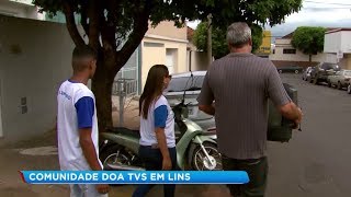 População carente recebe doação de televisores e conversores digitais
