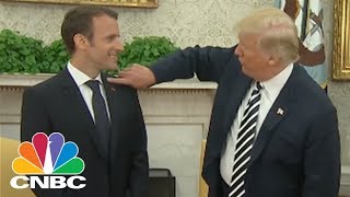 President Donald Trump Brushes Dandruff Off French President Macron | CNBC