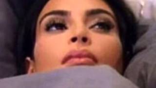 CLICK HERE TO WATCH KIM KARDASHIAN LAY DOWN POINTLESSLY FOR 4 SECONDS