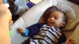 Baby mad at toy monkey