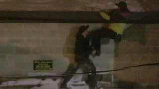 Drunk Canadian couple nearly dies trying to climb building