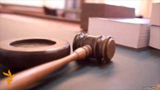 Хатирчи милициясининг собиқ бошлиғи суд залидан озод қилинди