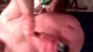 Opening a beer with a belly button