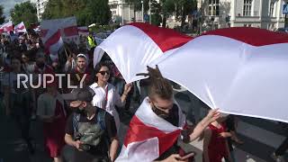 Poland: Hundreds join Belarusian opposition march in Warsaw