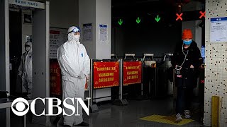 Cases of coronavirus in China surge overnight; U.S. issues more travel warnings