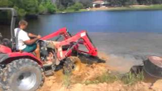 Drunk redneck bucked off tractor
