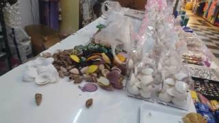 งานกลุ่มเรื่องภูมิปัญญาการทำโมบายจากเปลือกหอยที่ ตลาด100เสา ต.บ้านเพ จ.ระยอง