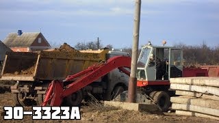 Пневмоколесный экскаватор ЭО-3323А