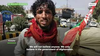 Protests continue as Taliban raises Islamic Emirate flag