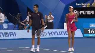 Ana Ivanovic throwing a ball at Novak Djokovic to stop him dancing (Funny)