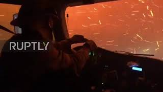 USA: Fire crew drive through burning Tamarack Fire in northern California