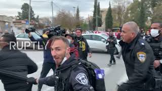 East Jerusalem: Clashes erupt as Israeli police disperse rally against eviction in Sheikh Jarrah