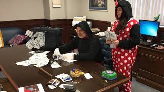 Genesee County clerk-register wears Mickey Mouse costume at press conference