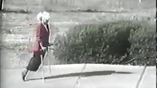 Classic amputee woman crutching