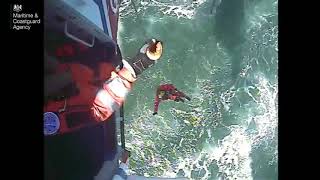 Two men safely rescued from bow of their sinking capsized vessel off Walney Island