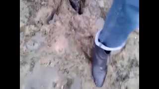 dress boots in the deep mud