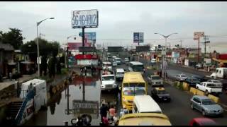 Inundación en puente de San Felipe por intensa lluvia en Puebla