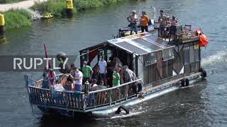 Germany: Dozens of protesters take to Berlin Spree to urge end of fossil fuels by 2030
