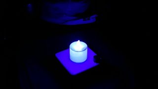 Smoldering LED candle on batteries