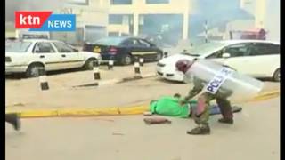 WARNING - GRAPHIC VIDEO: Police kicking fallen protester during anti-IEBC demonstration