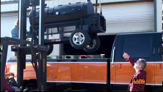 Loading A Lang Hybrid Smoker Cooker for New Jersey