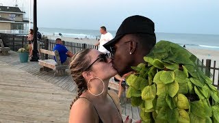 KISSING GIRLS DRESSED AS A TREE ??