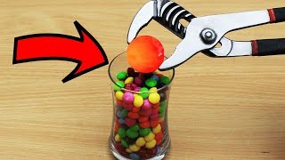 EXPERIMENT Glowing 1000 degree METAL BALL vs SKITTLES