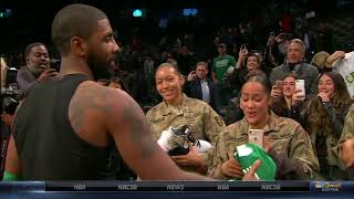 Kyrie Irving gives jersey and shoes to veterans sitting courtside | ESPN