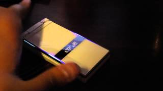 Необычный телефон раскладушка Sharp Docomo SH-03D Aquos Shot