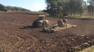 Amazone 12m Catros on ploughed land