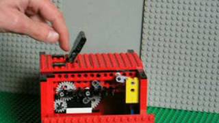 clockwork LEGO Useless Machine -- turns itself off