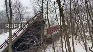 USA: Damaged commuter bus and vehicles on collapsed bridge in Pittsburgh