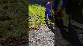 Spider kid tommy mows lawn