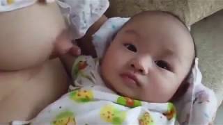 baby feeding mother milk